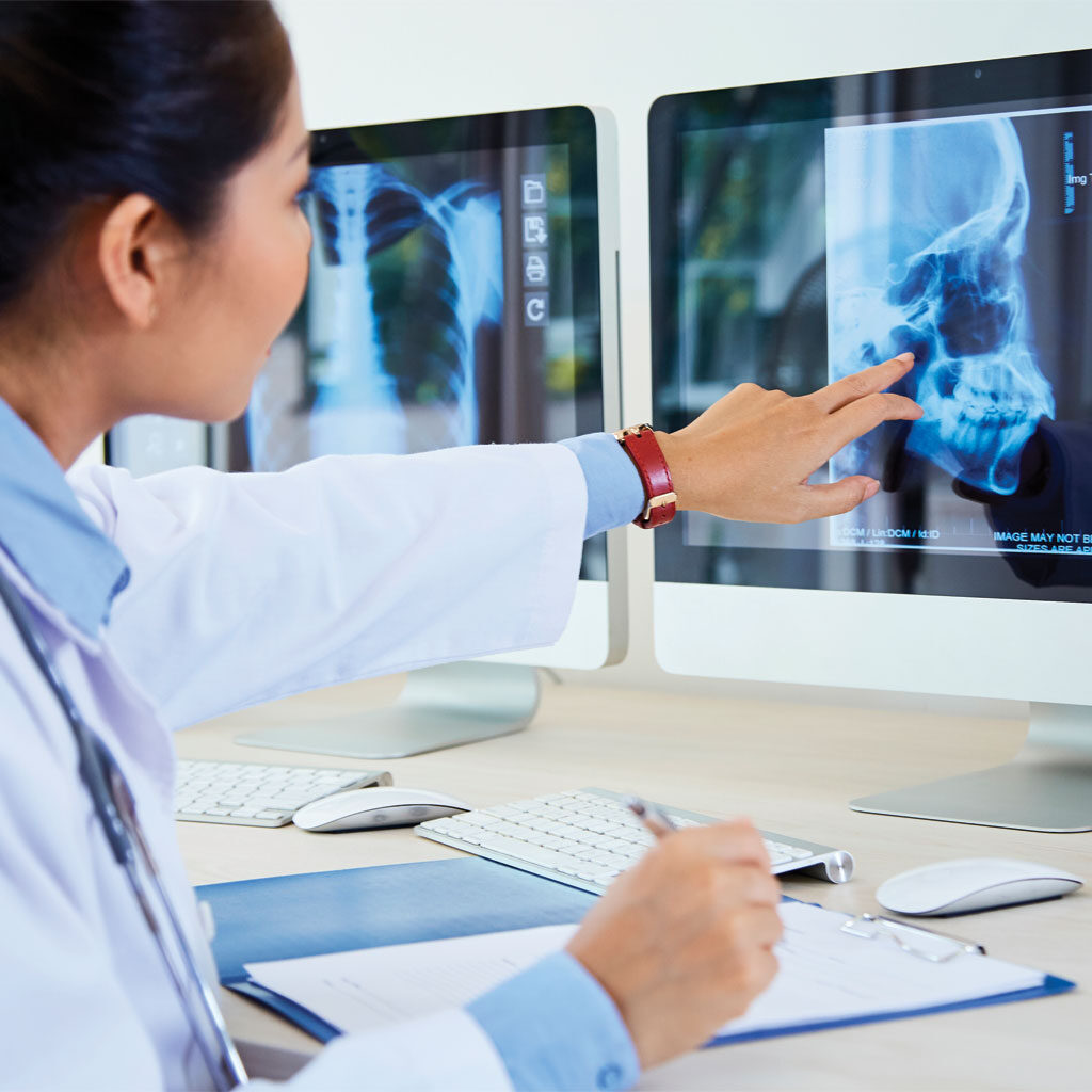 Doctor examining x-ray