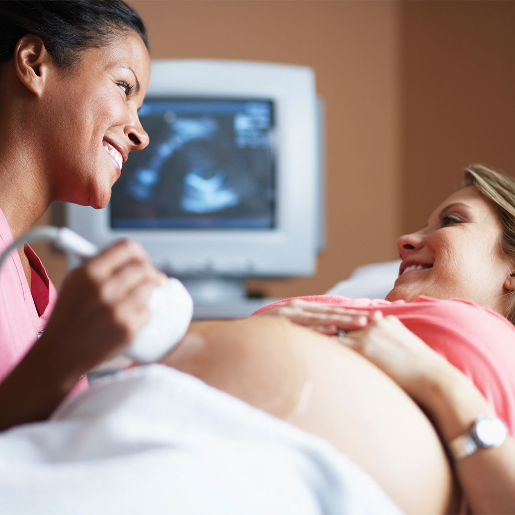 Nurse and patient during an ultrasound