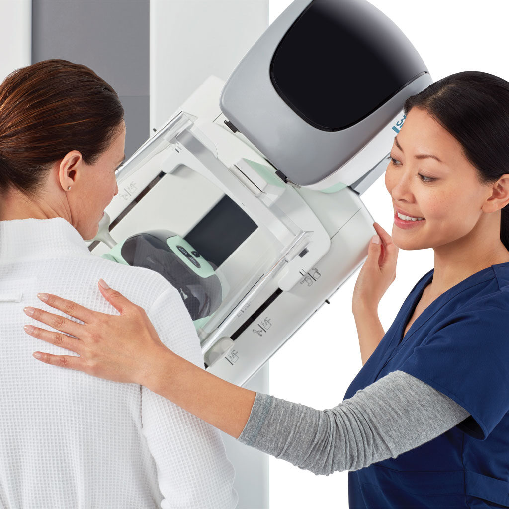 Patient and nurse during 3D mammography