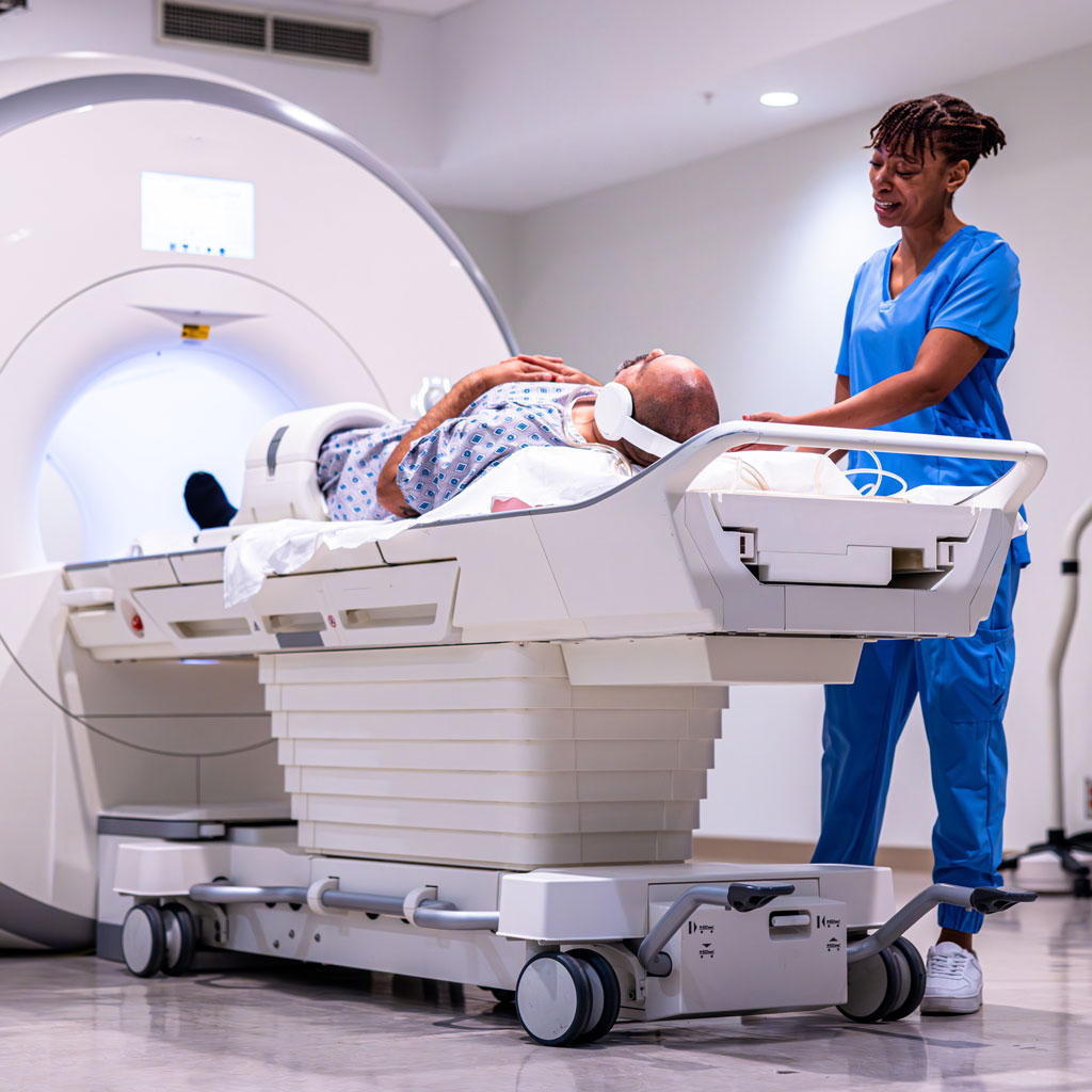 Man With Doctor Preparing for MRI Scans