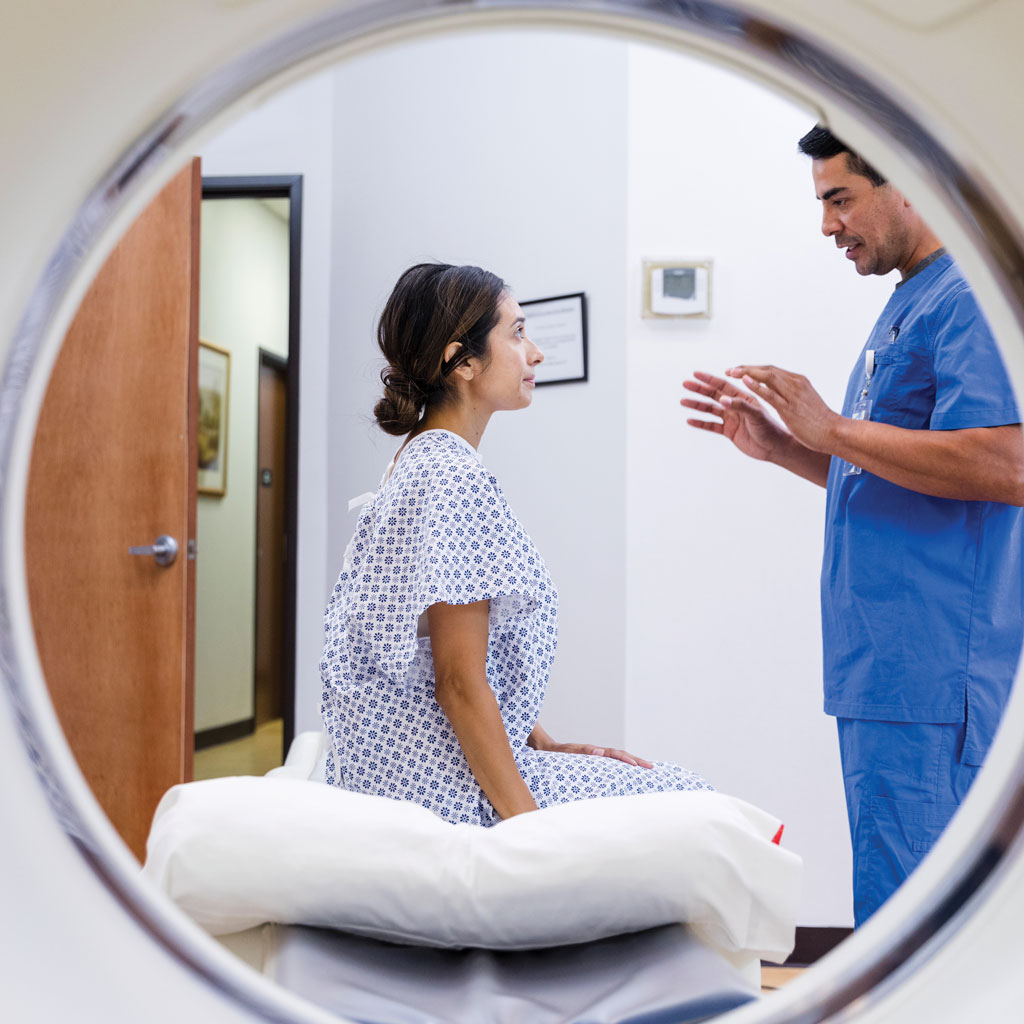 Doctor Discussing How Much Radiation is Actually in a Scan Before CT
